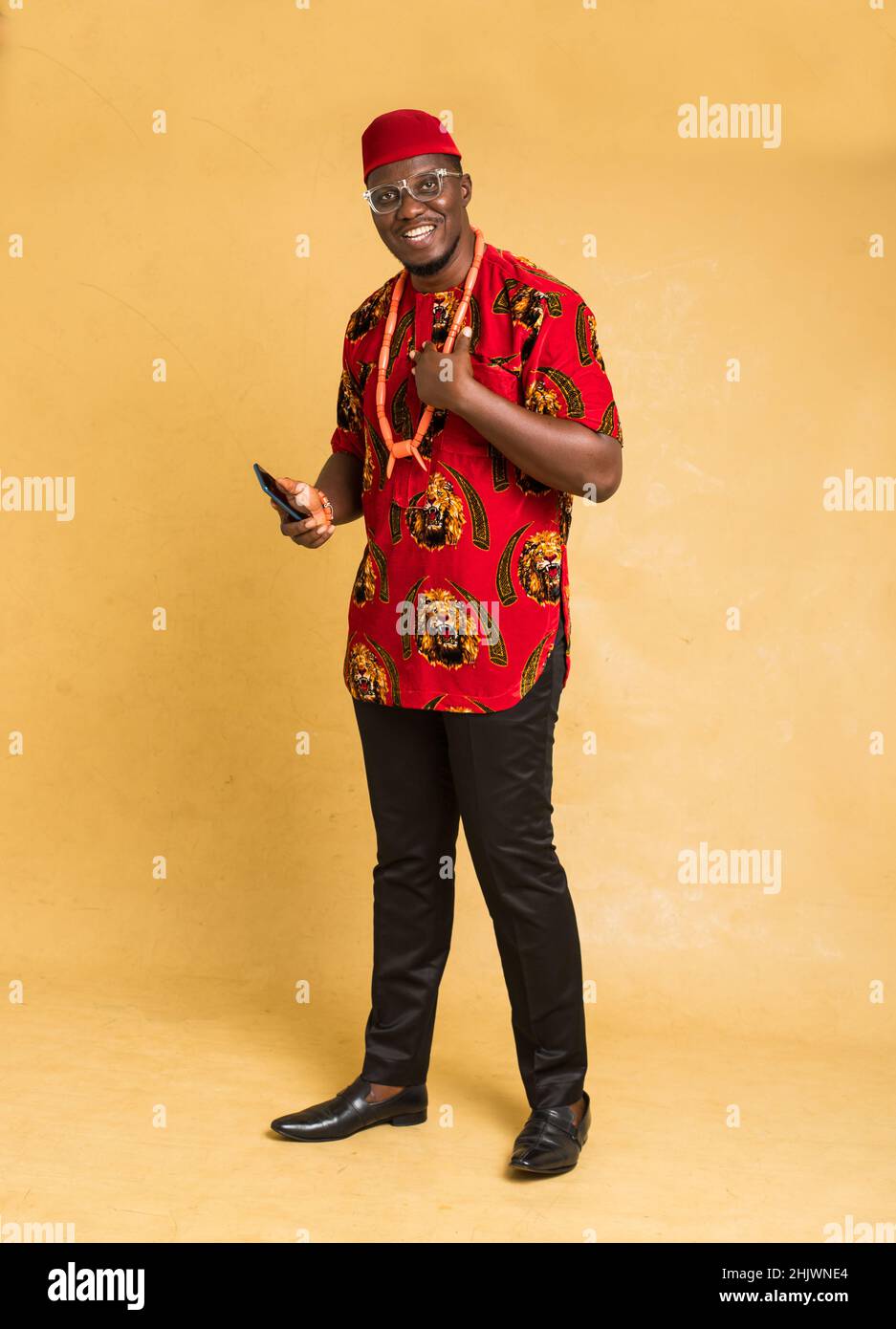 Nigerian man in traditional costume hi res stock photography and