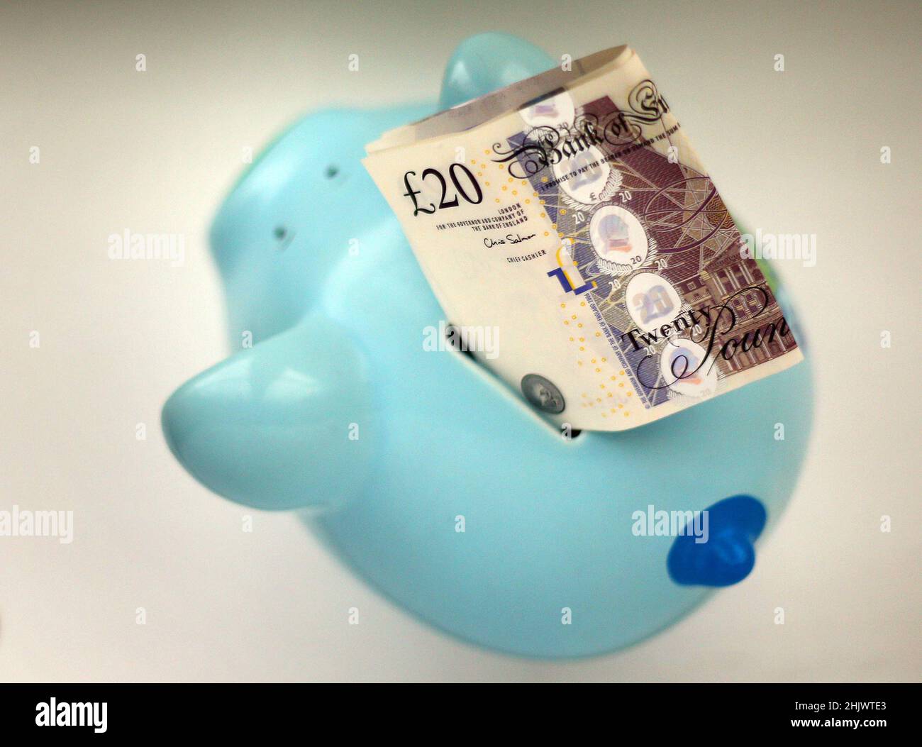 File photo dated 06/01/15 of money in a piggy bank. Some pension savers could be thousands of pounds worse off if they fail to shift older pots into ones offering better value for money, the IFS (Institute for Fiscal Studies) has warned. Many working-age people have pension pots that they are no longer actively contributing to - and there are concerns that these pots could provide declining value for money over time if savers do not engage with them. Issue date: Tuesday February 1, 2022. Stock Photo