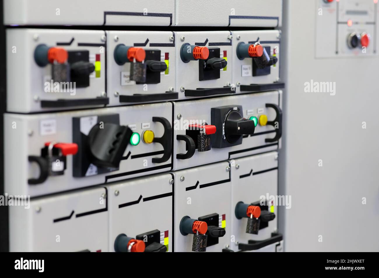 Industrial power distribution cabinet. Electrical distribution board. Circuit breaker panel. Selective focus. Stock Photo