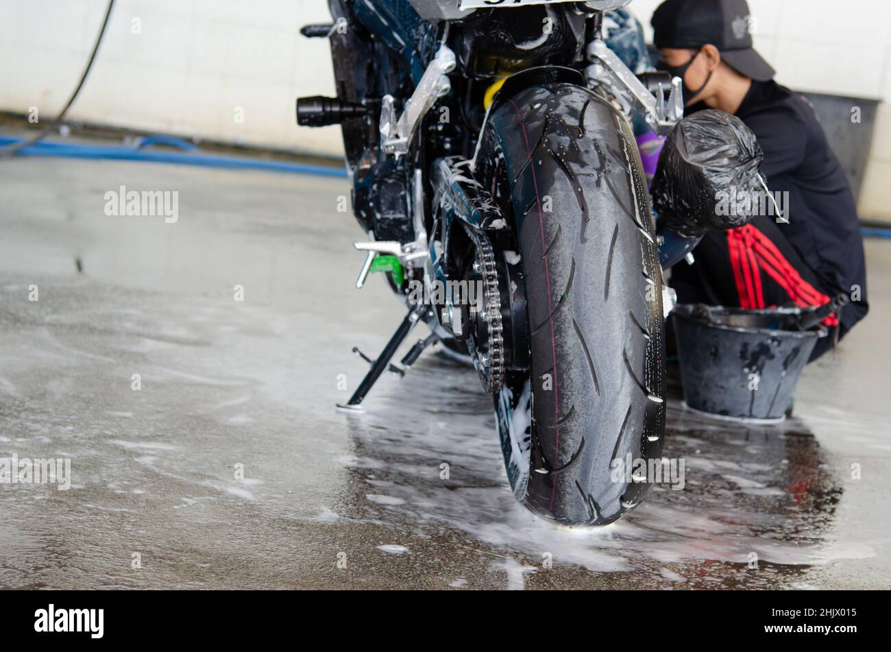 Cleaning the motorbike at the car wash shop Stock Photo Alamy