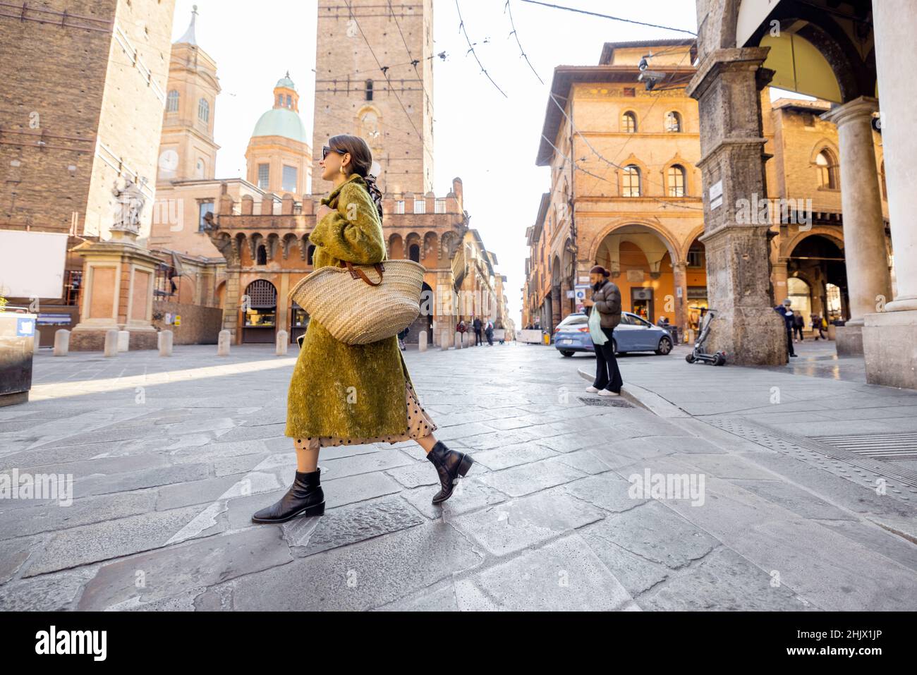 Woman walks the street hi-res stock photography and images - Alamy