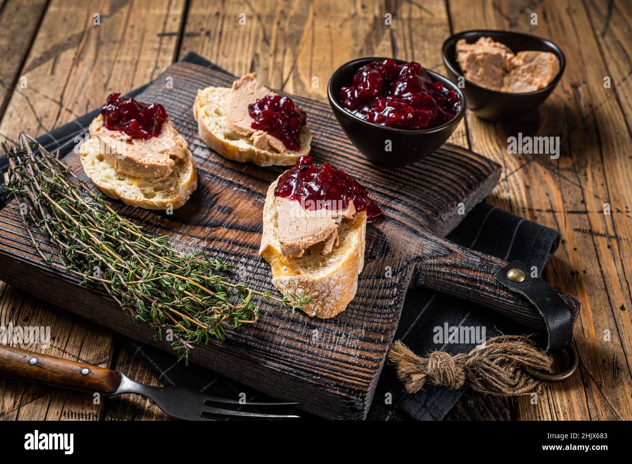 French cuisine Foie gras toasts, goose liver pate and lingonberry