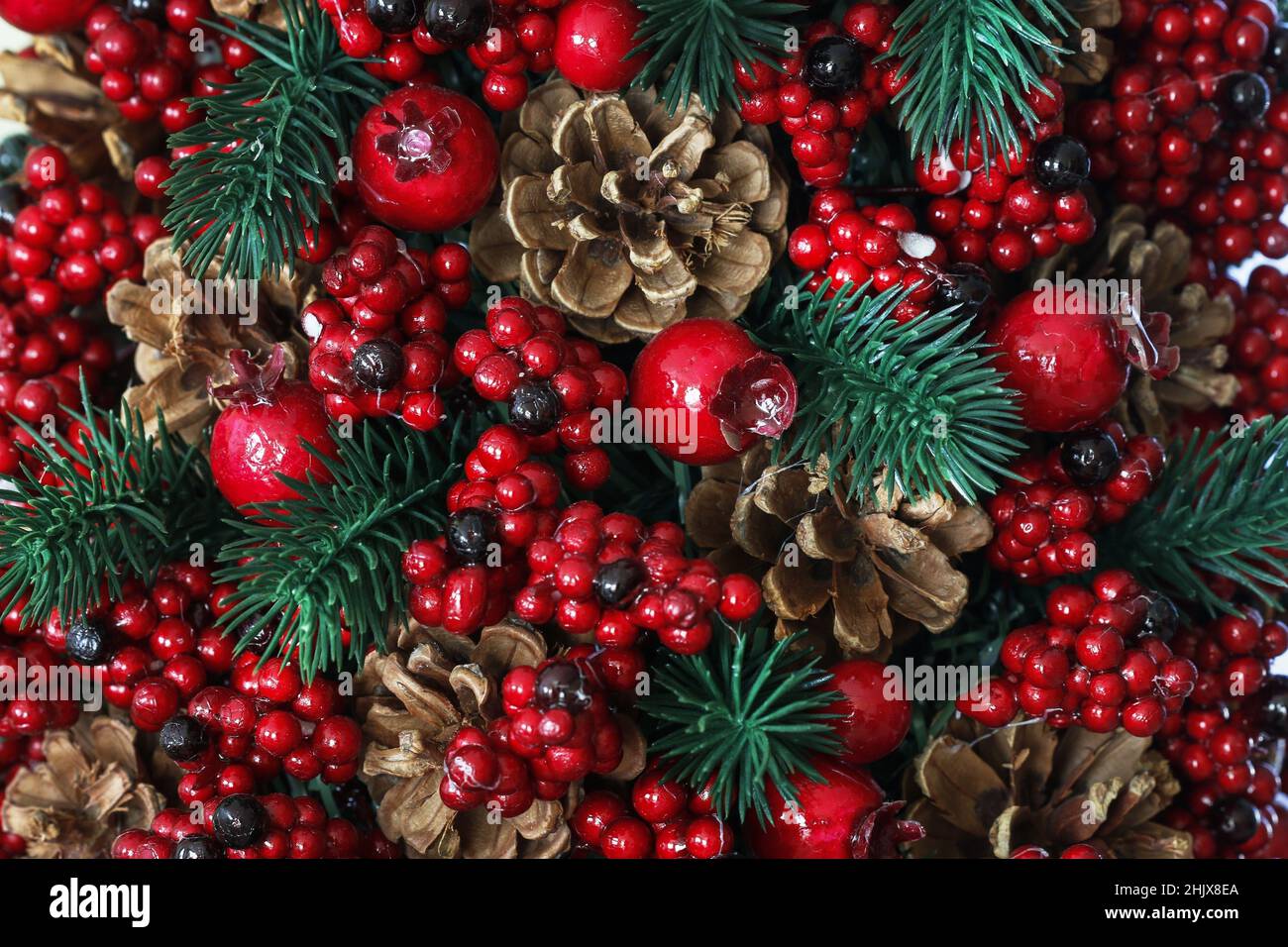 Christmas background with red berries, cones and fir twigs. Graphic ...