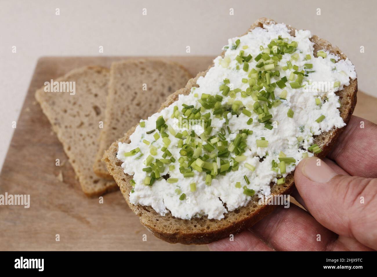 Bread with cottage cheese and chives. Breakfast dish Stock Photo Alamy
