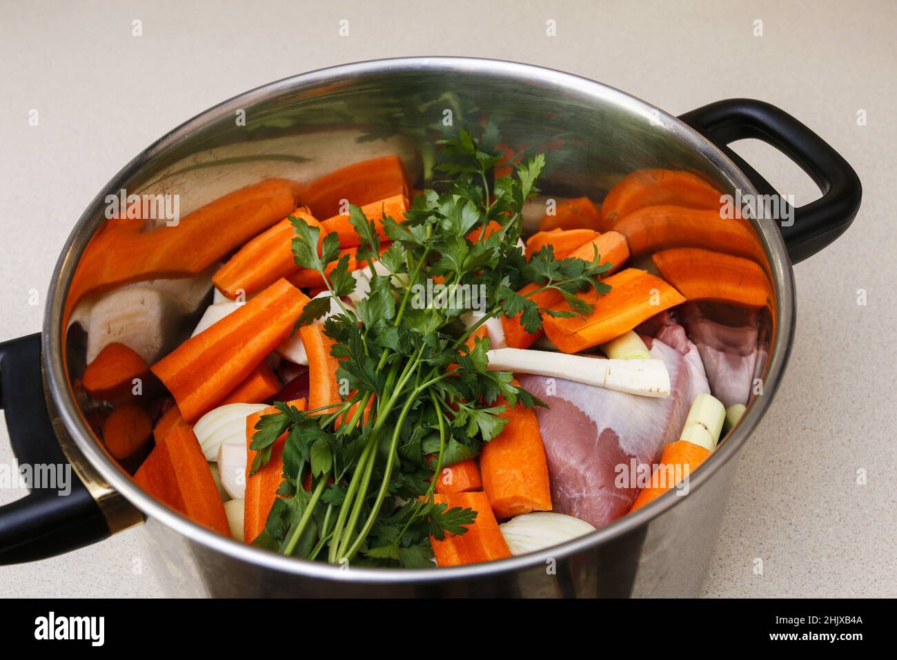 Chef at work: How to make a broth. Step by step, tutorial. Stock Photo