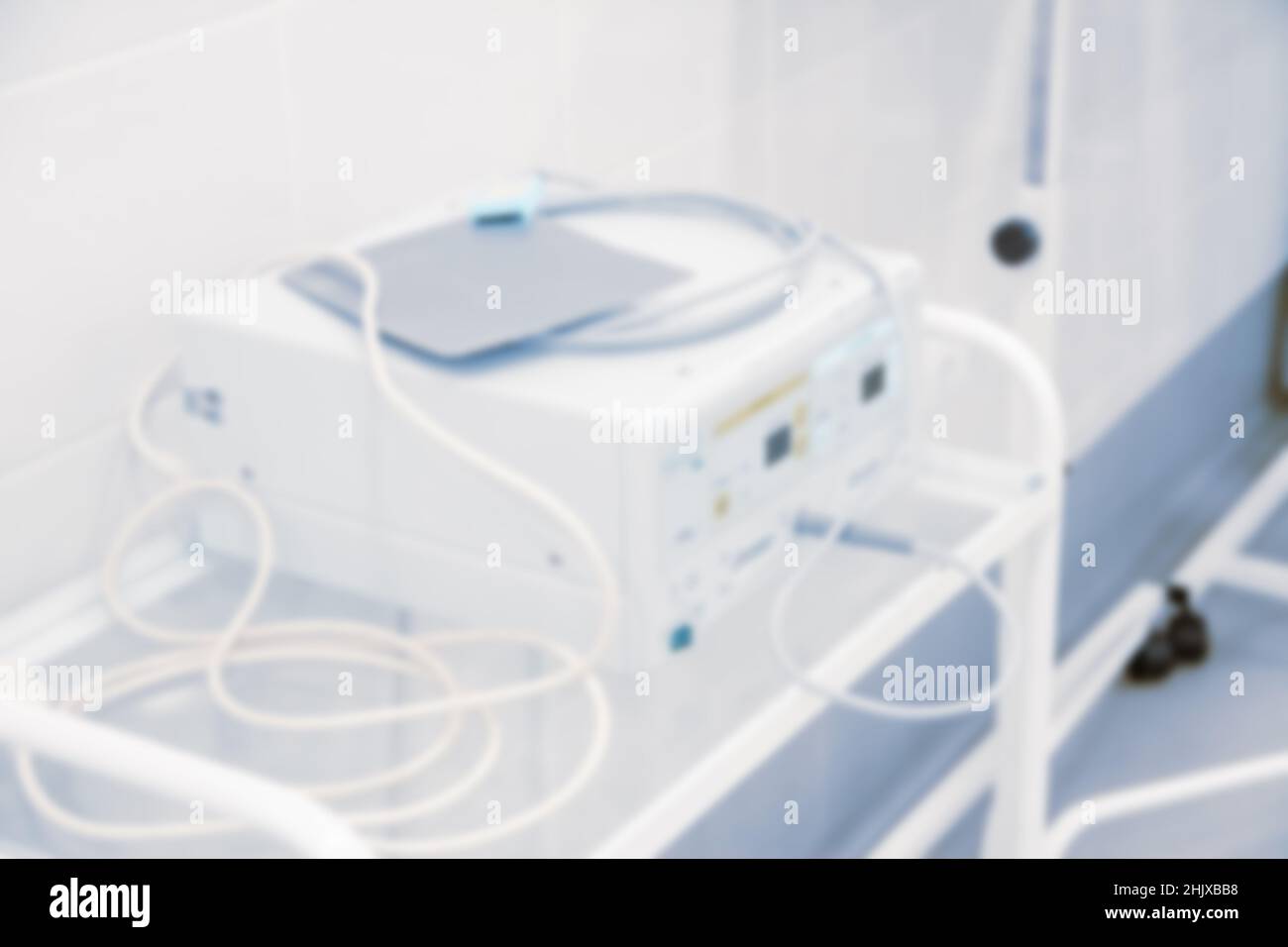 Abstract blur of hospital and clinic interior. Modern equipment in operating room. Medical devices for neurosurgery. Surgery instruments and surgical Stock Photo