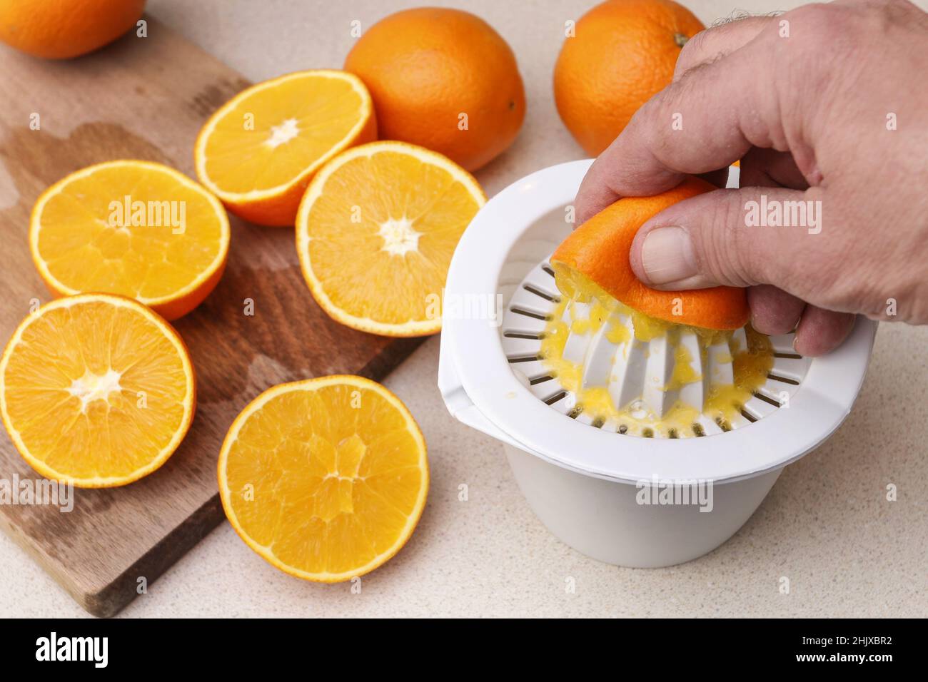 How to make a fresh orange juice. Step by step, tutorial. Healthy food Stock Photo Alamy