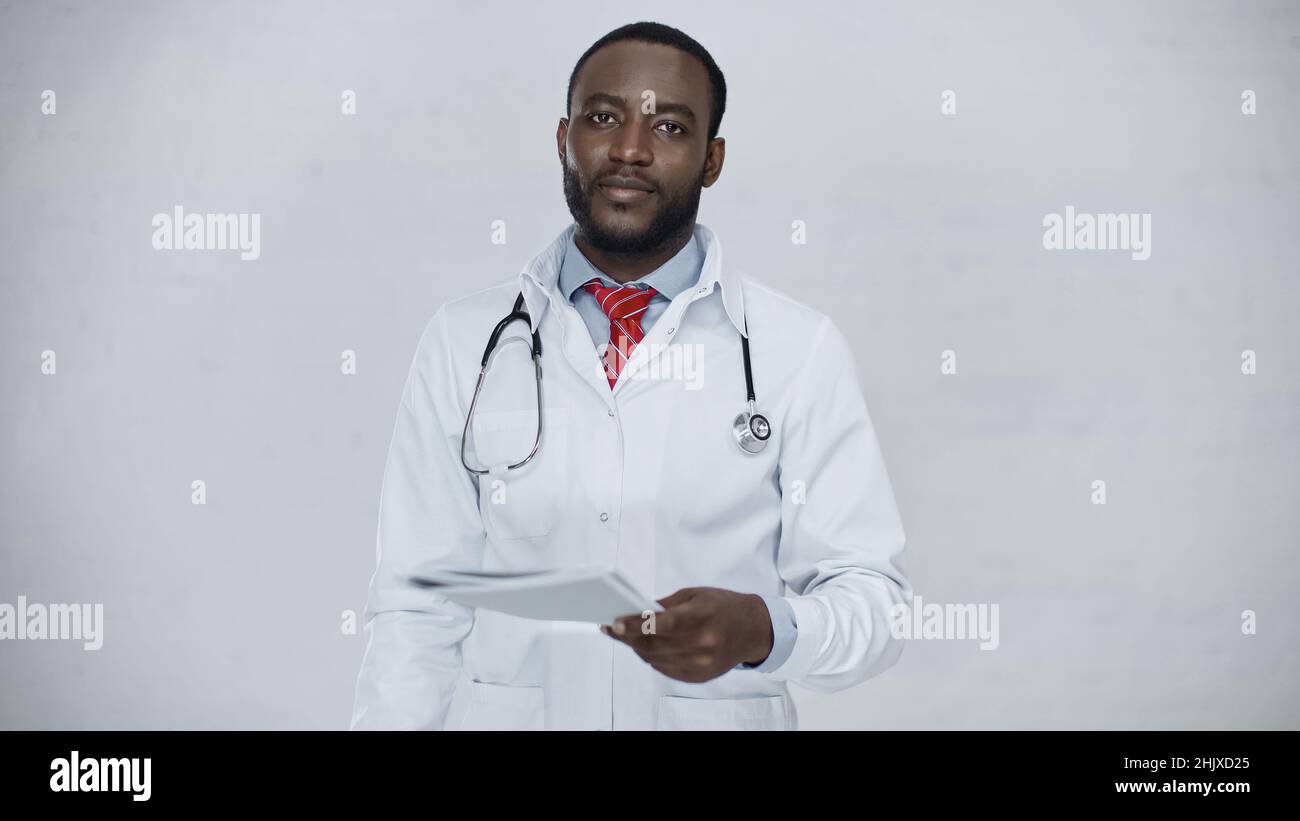 Handsome bearded doctor folder hi-res stock photography and images - Alamy