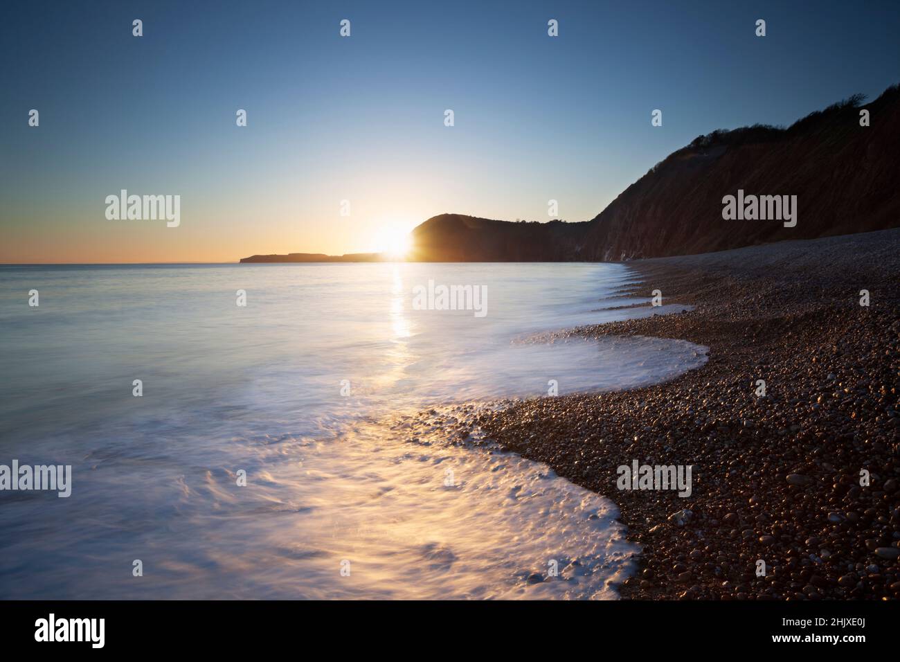 Sunset at Jacob's Ladder Beach. Sidmouth, Devon, UK. Stock Photo