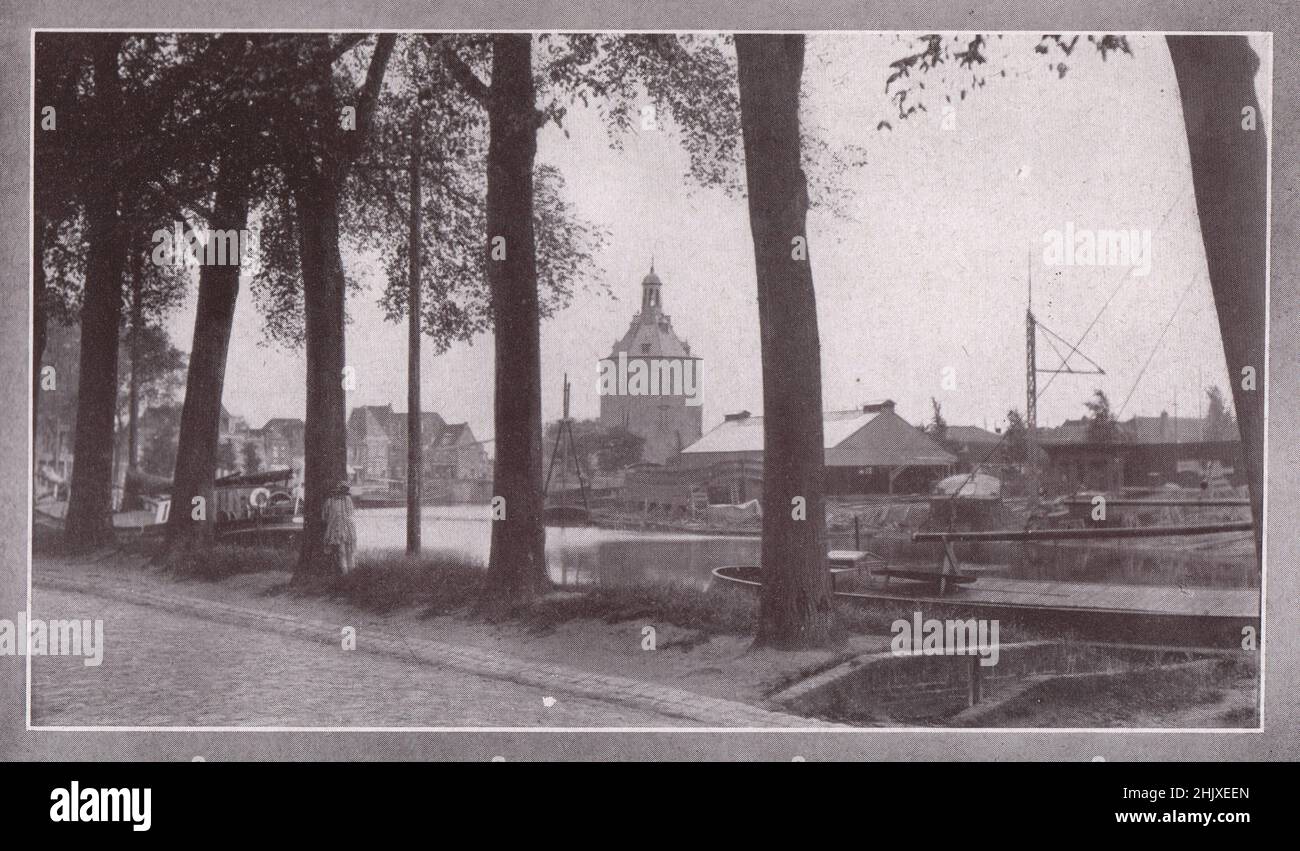 Enkhuizen : the harbour and Dromedaris Tower. Netherlands. Holland (1925) Stock Photo