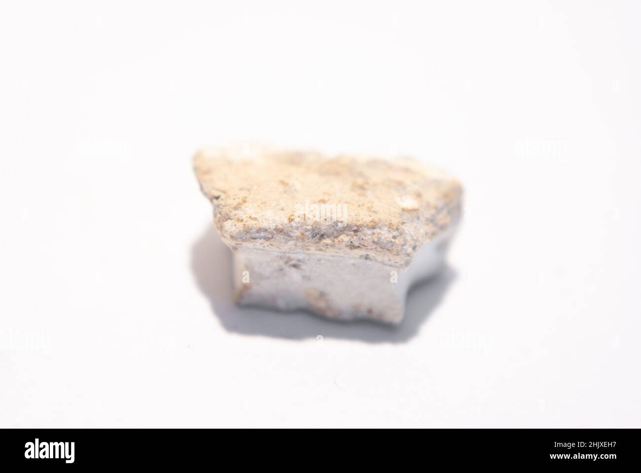 small limestone on a white background Stock Photo