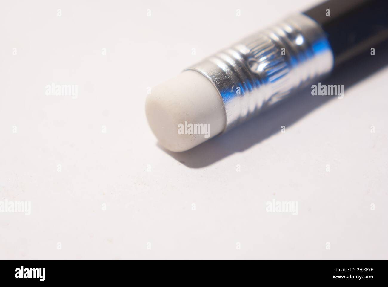 one black pencil with eraser on a white background Stock Photo - Alamy