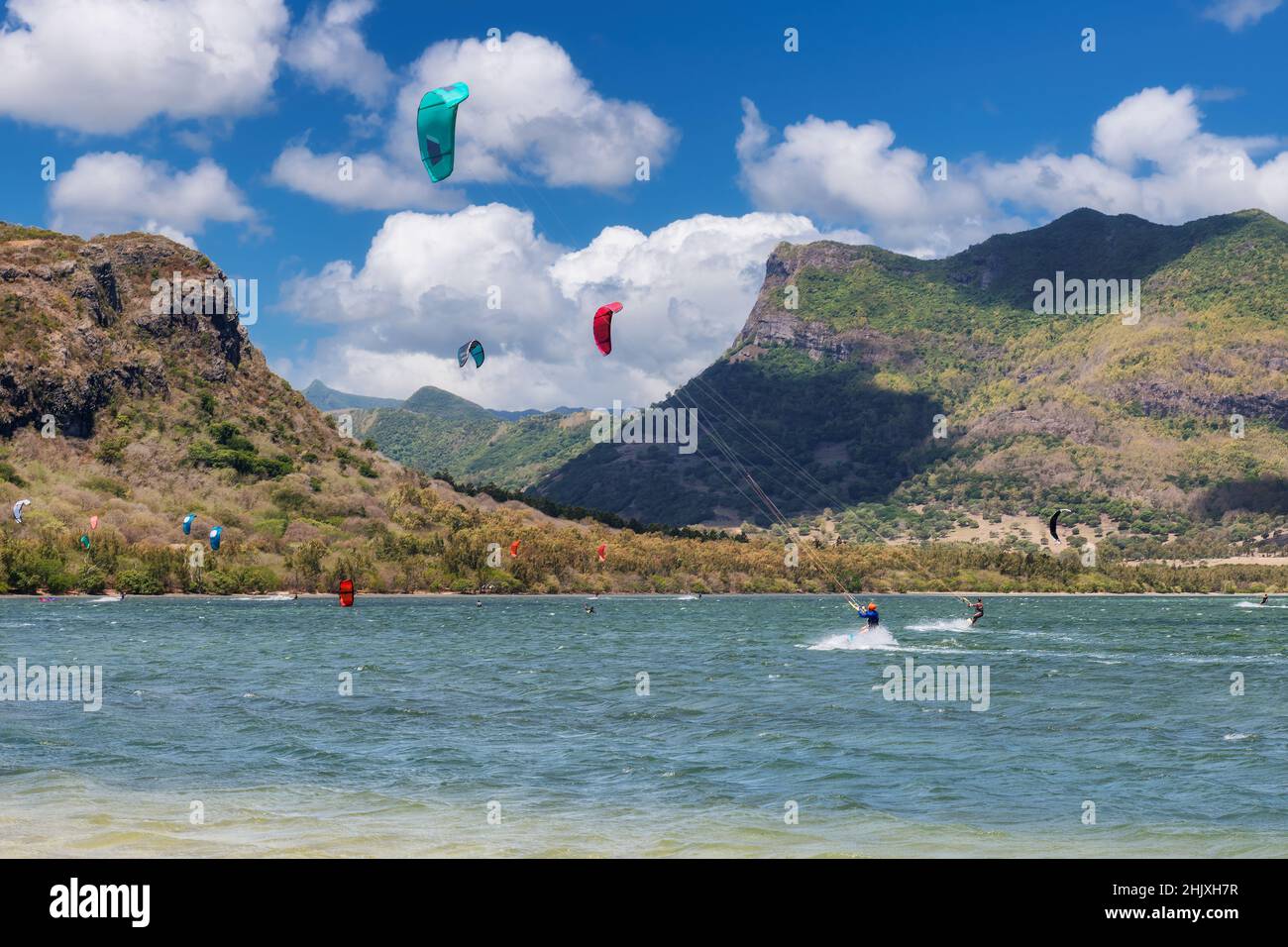 Kite surfing in the clear waters of the Indian Ocean in Le Morne beach, Mauritius. Stock Photo