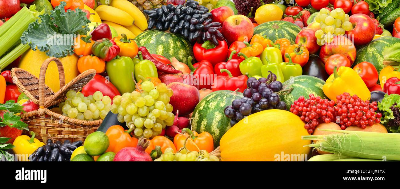 Large fruit colorful background of fresh vegetables and fruits. Stock Photo