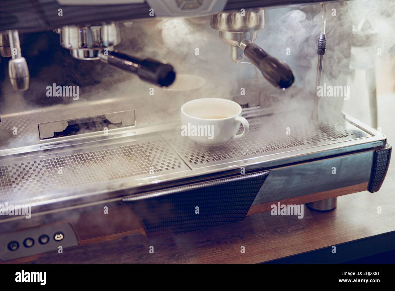 Professional automatic coffee machine brewing coffee in cafe Stock