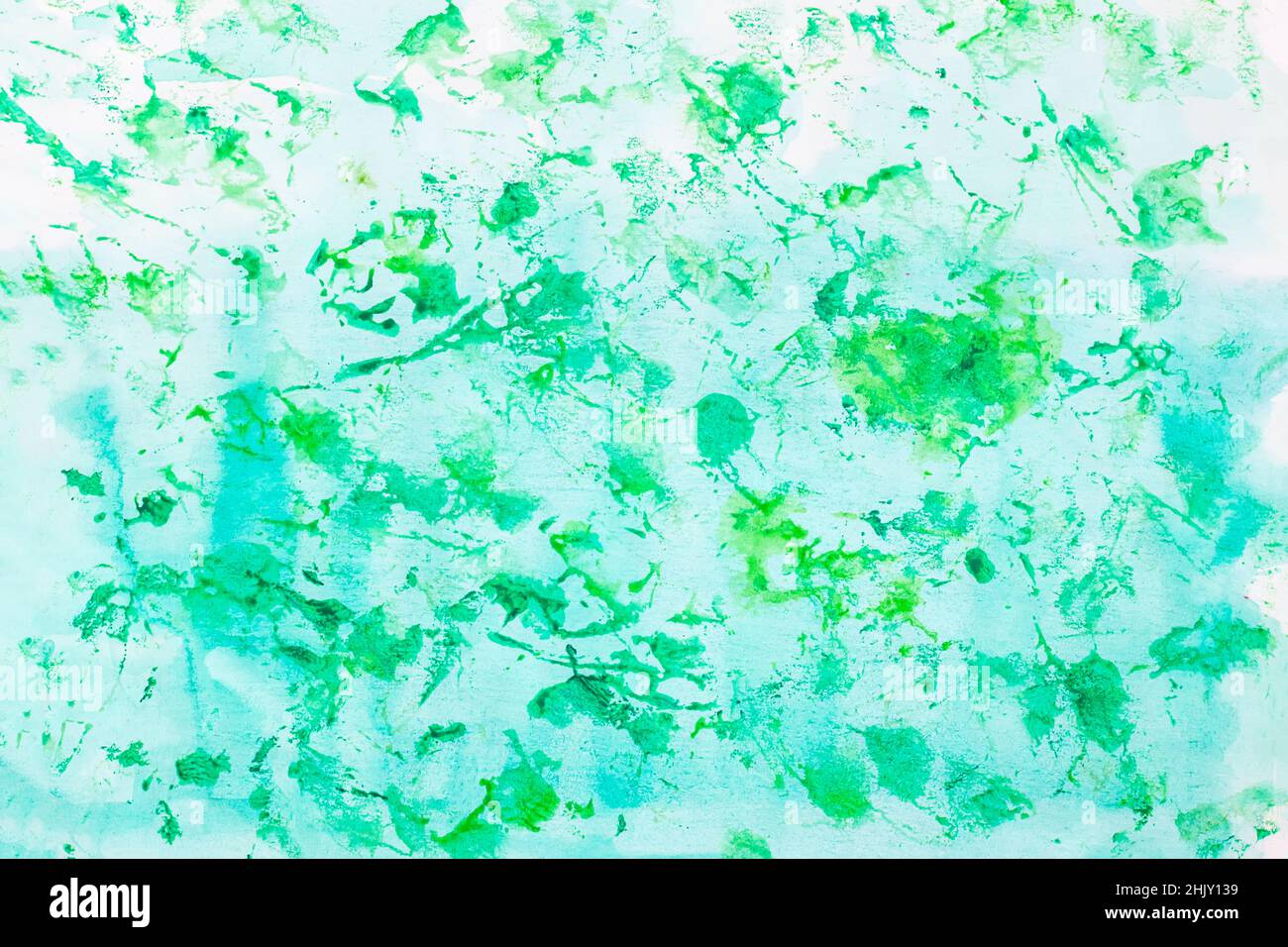 Abstract background of hand drawn watercolor spots, splashes of green ...