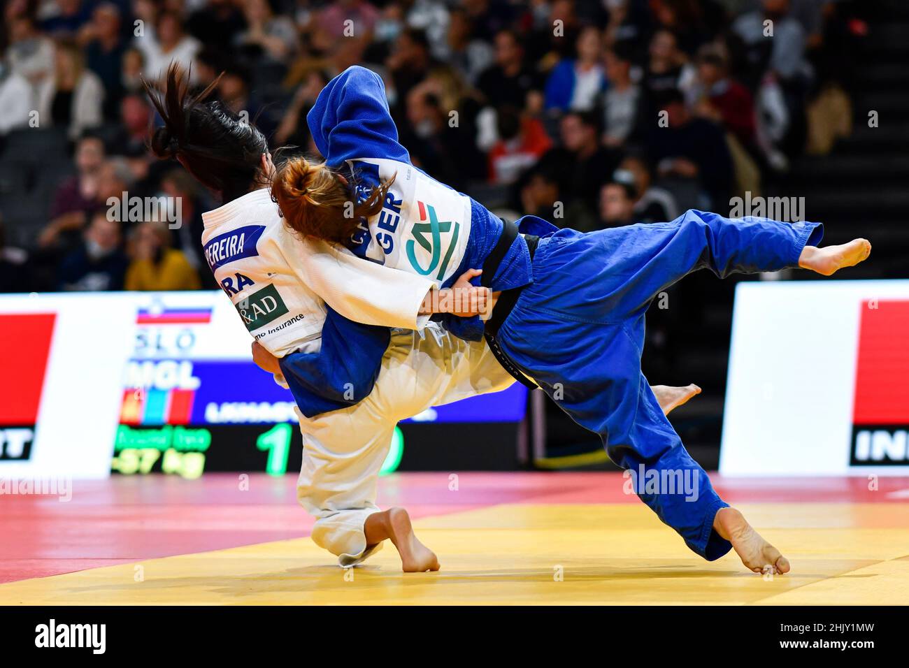 Women -57 kg, Caroline FRITZE of Germany Silver medal (blue) throws Jessica PEREIRA of Brazil during the Paris Grand Slam 2021, Judo event on October Stock Photo