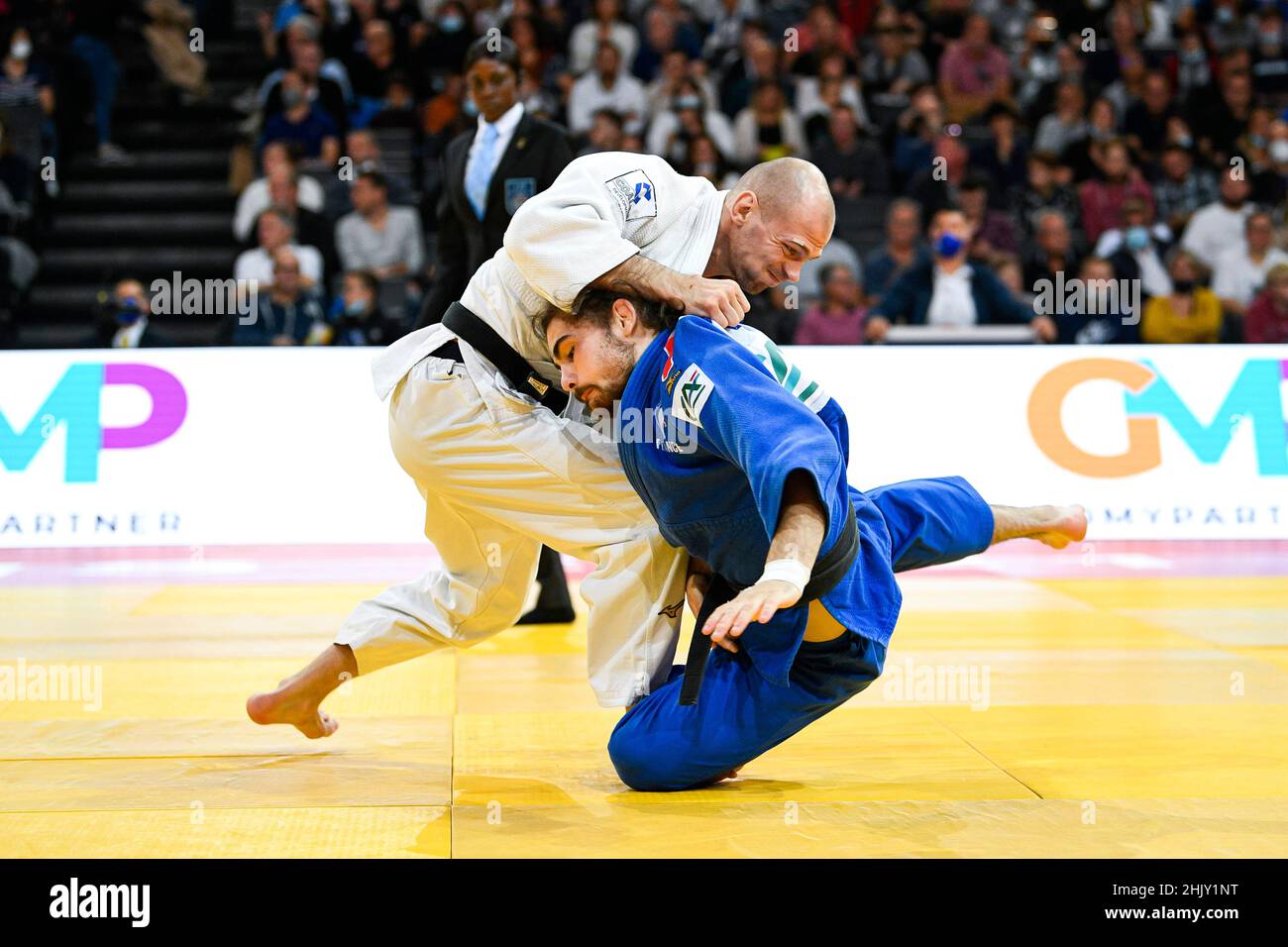 Men -73 kg, Denis IARTCEV (white) of Russia and Theo RIQUIN (blue) of France Silver medal compete during the Paris Grand Slam 2021, Judo event on Octo Stock Photo