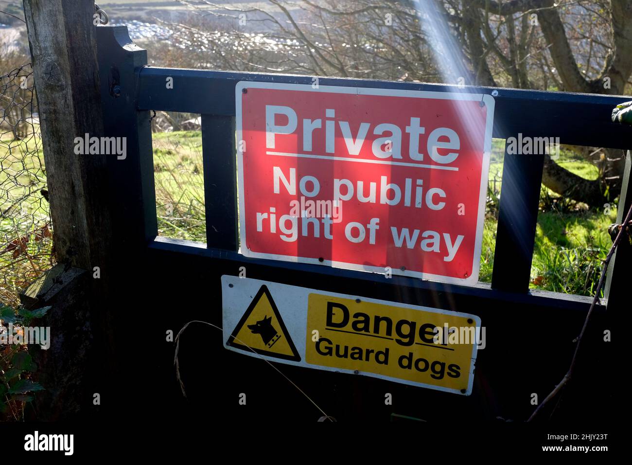 sign,private,no,public,right,of,way,danger,guard,dog,country,land,farm,gate,fence,access,accessible,activity,active,path,walking,Isle of Wight, Stock Photo