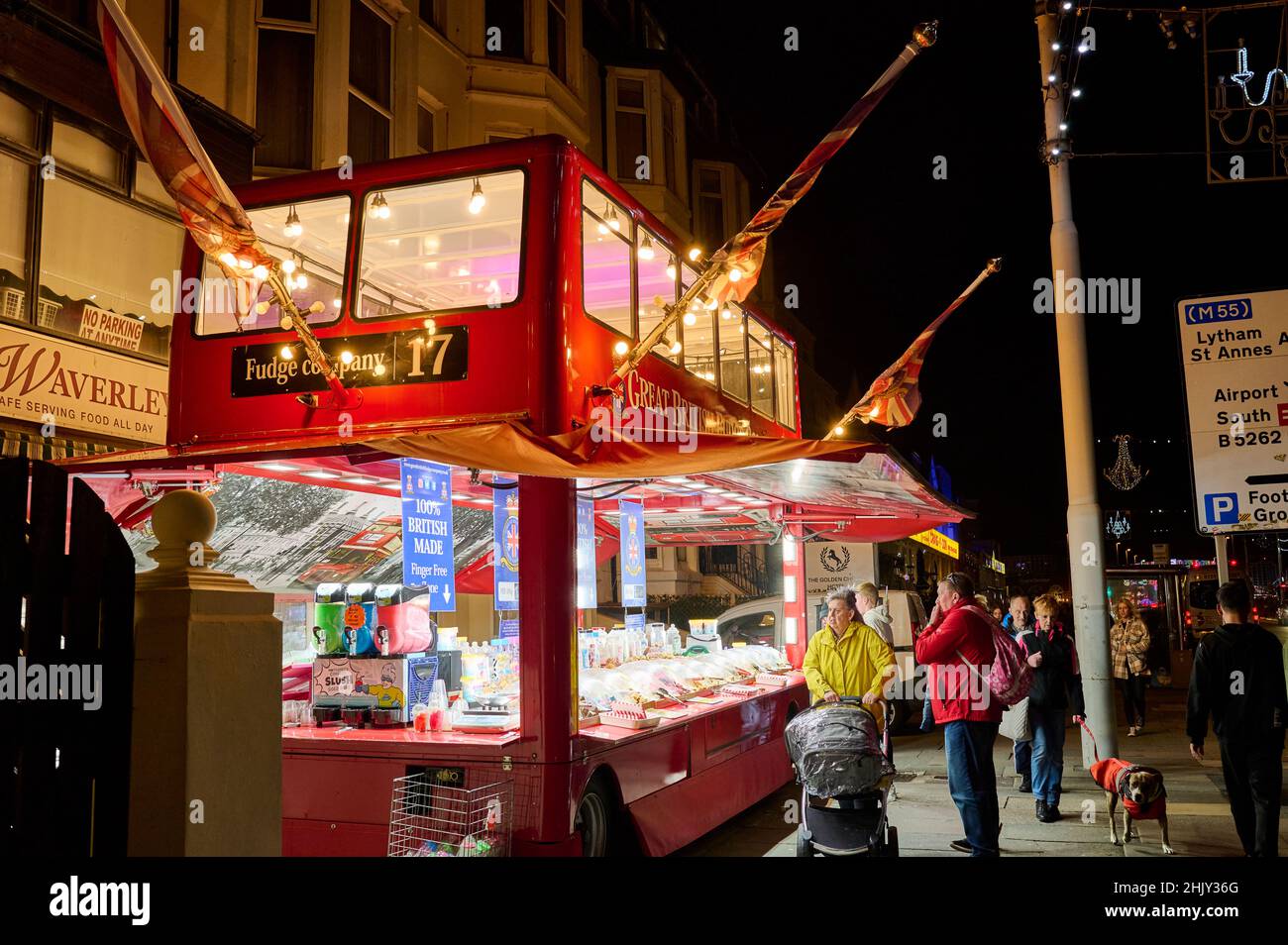 The fudge company red bus on Blackpool promenade Stock Photo Alamy