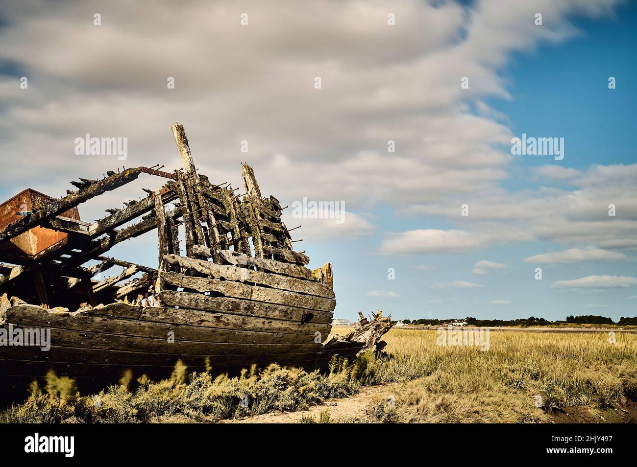 Wrecked and beached old trawlers sat on the River Wyre estuary at Fleetwood Stock Photo