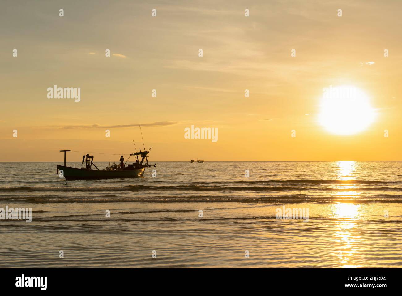 Silhouette of boats during sunset Stock Photo