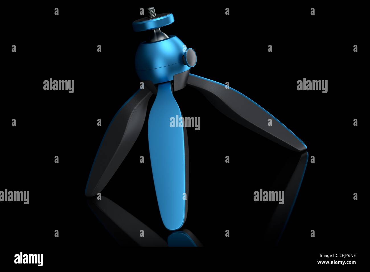 Photo and video tripod with quick release plate isolated on black ...