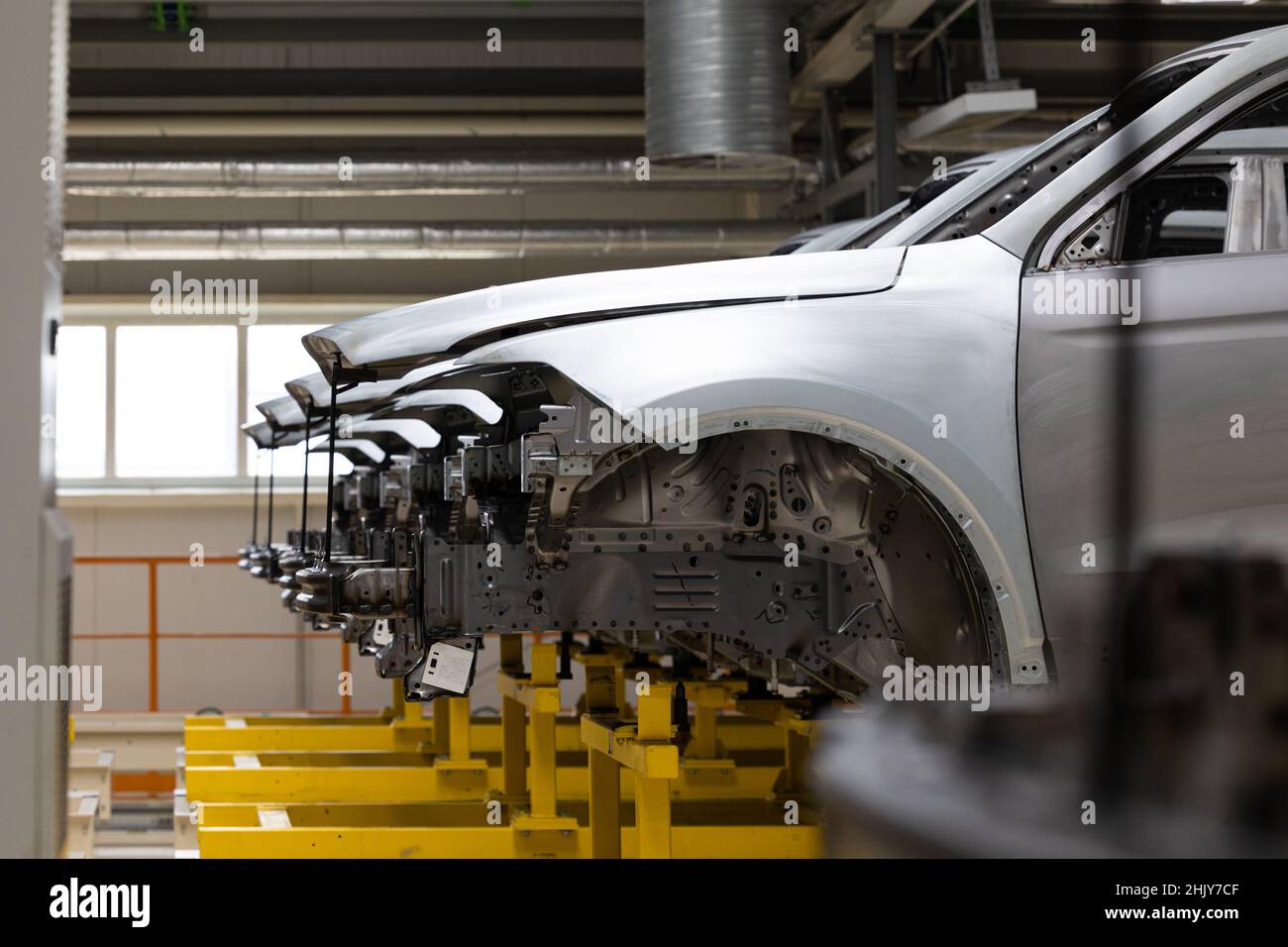 Photo of automobile production line. Welding car body. Modern car ...