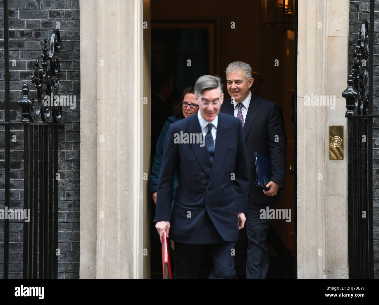 Downing Street, London, UK. 1 February 2022. Jacob Rees-Mogg MP, Lord President of the Council, Leader of the Commons leaves 10 Downing Street after weekly cabinet meeting followed by Brandon Lewis MP, Secretary of State for Northern Ireland, and Natalie Evans, Baroness Evans of Bowes Park, Leader of the House of Lords, Lord Privy Seal. Credit: Malcolm Park/Alamy Live News. Stock Photo