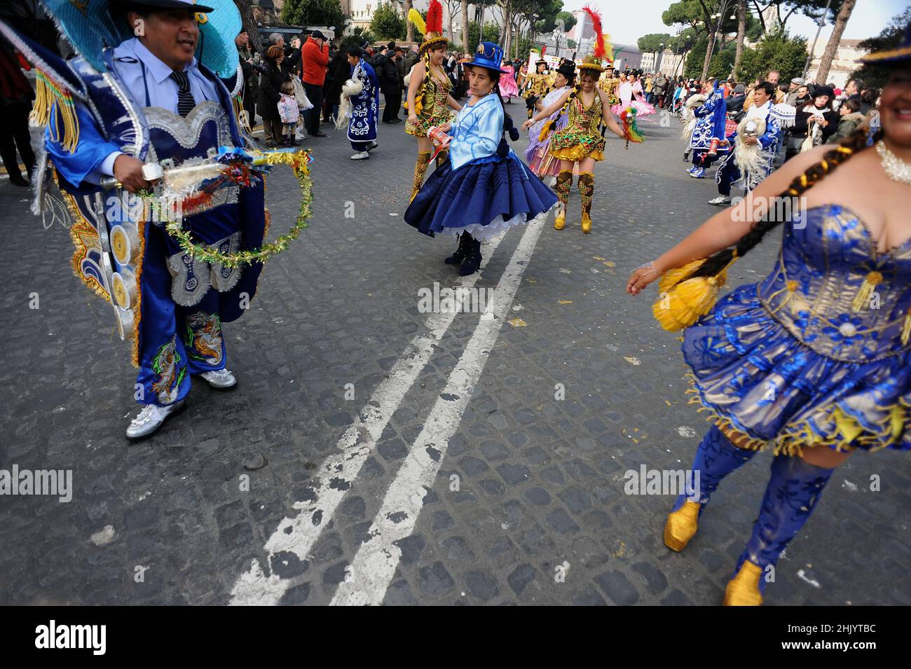 Rome, Italy 14/02/2010: First Edition of the Latin American Carnival in Rome. Via dei Fori Imperiali, Colosseum. © Andrea Sabbadini Stock Photo