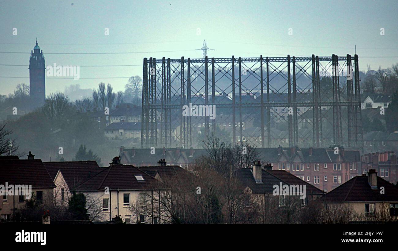 Glasgow, Scotland, UK 1st February, 2022. UK  Weather: Grey day as the bad weather continues with rain and darkness over the west end of the city and the kelvindale gasometer a symbol of the 1950s feeling of misery. Credit Gerard Ferry/Alamy Live News Stock Photo