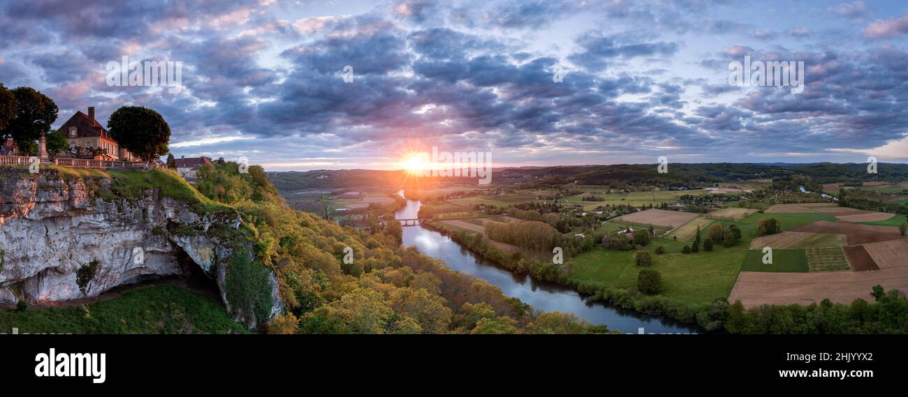 Autumn sunset panoramic from viewing point at Domme with the Dordogne valley, Dordogne river, fields and Cenac bridge Domme Dordogne France Stock Photo