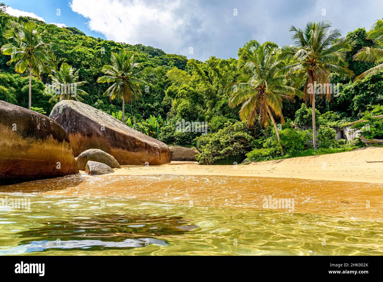 Beautiful deserted and unspoilt beach surrounded by rainforest on Ilha Grande, south coast of Rio de Janeiro Stock Photo