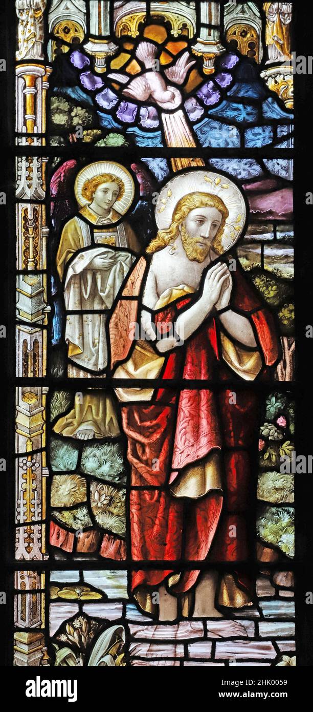 A stained glass window by F.A Oldaker depicting the baptism of Christ, Christ Church, Swindon, Wiltshire Stock Photo