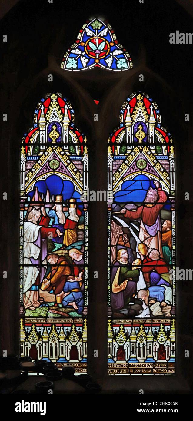 A stained glass window by William Wailes depicting Moses Splitting the Rock of Horeb, Christ Church, Swindon, Wiltshire Stock Photo