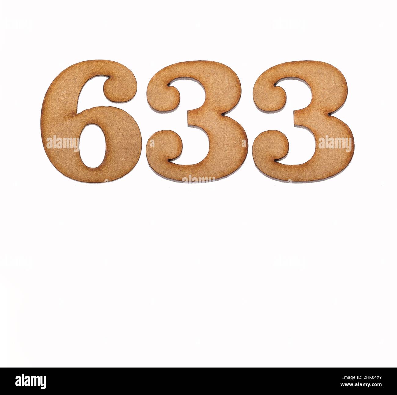 Number 633 in wood, isolated on white background Stock Photo - Alamy