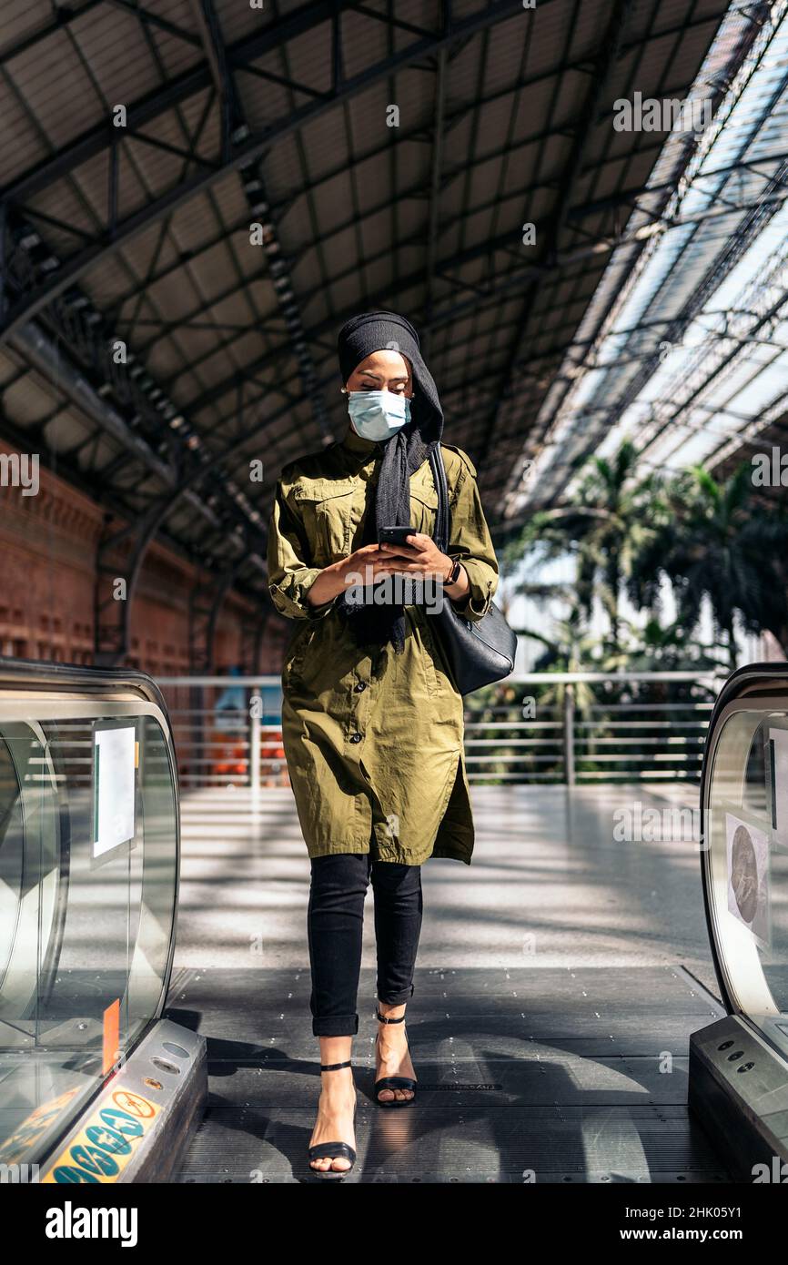 Bussiness muslim woman on a train station Stock Photo