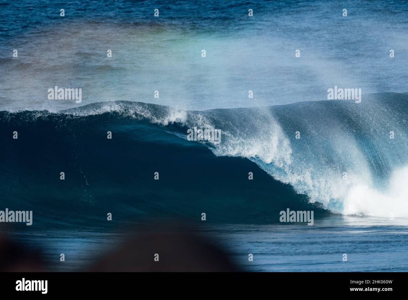 Blue wave breaking on a surfing beach in Canary Islands Stock Photo