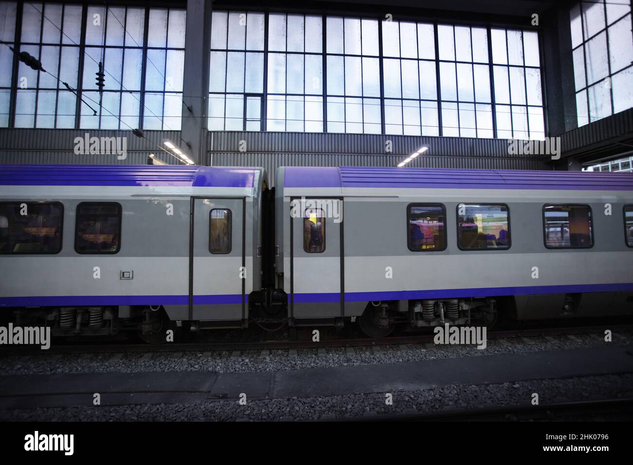 Two intercity train cars standing on the station Stock Photo - Alamy