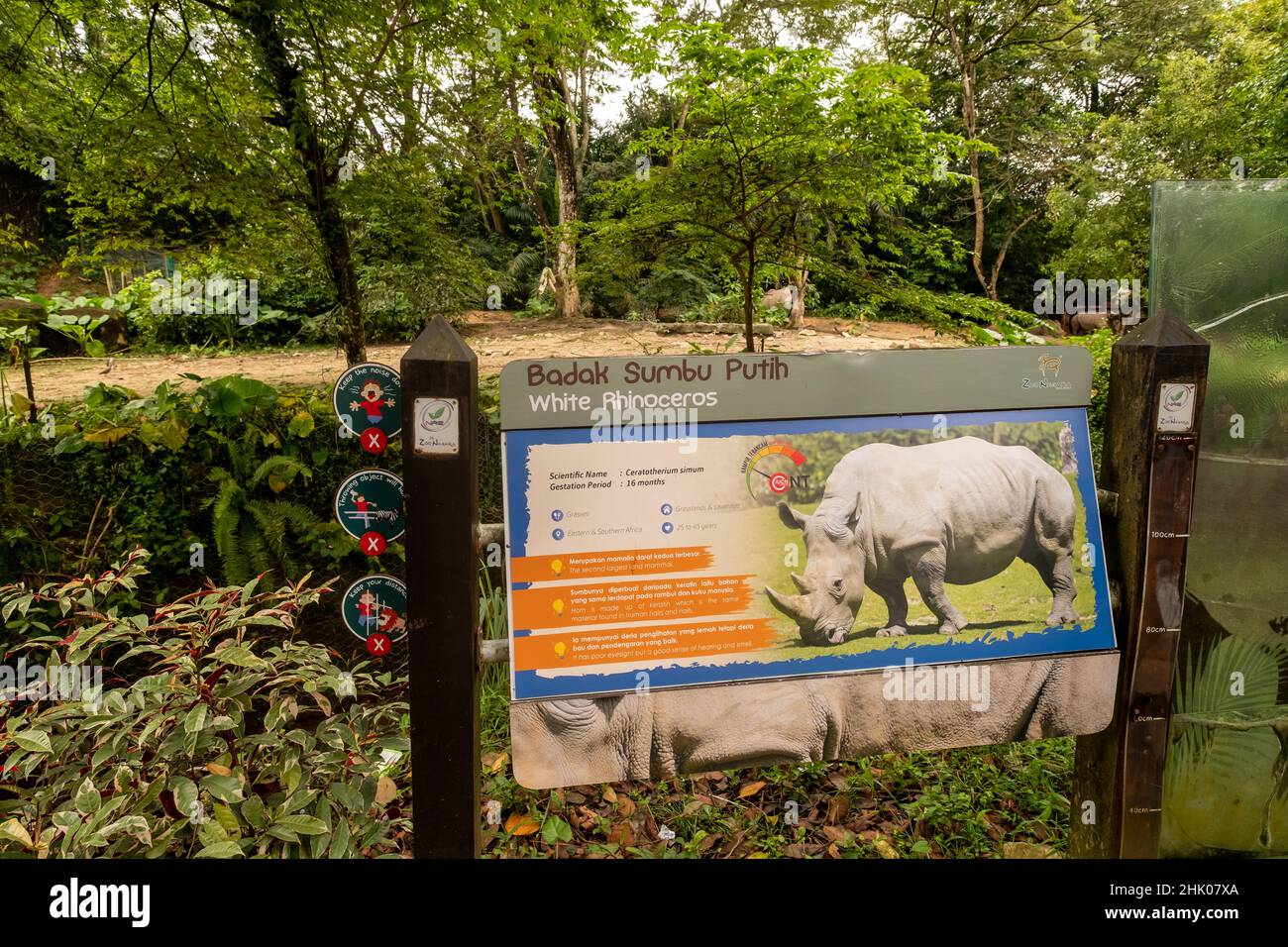 Kuala Lumpur, Malaysia- January 2022: Rhinoceros enclosure at Zoo Negara, a large zoo and popular city tourist attraction Stock Photo
