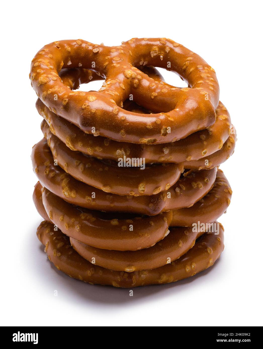 Stacked Large Pretzels Cut Out on White. Stock Photo