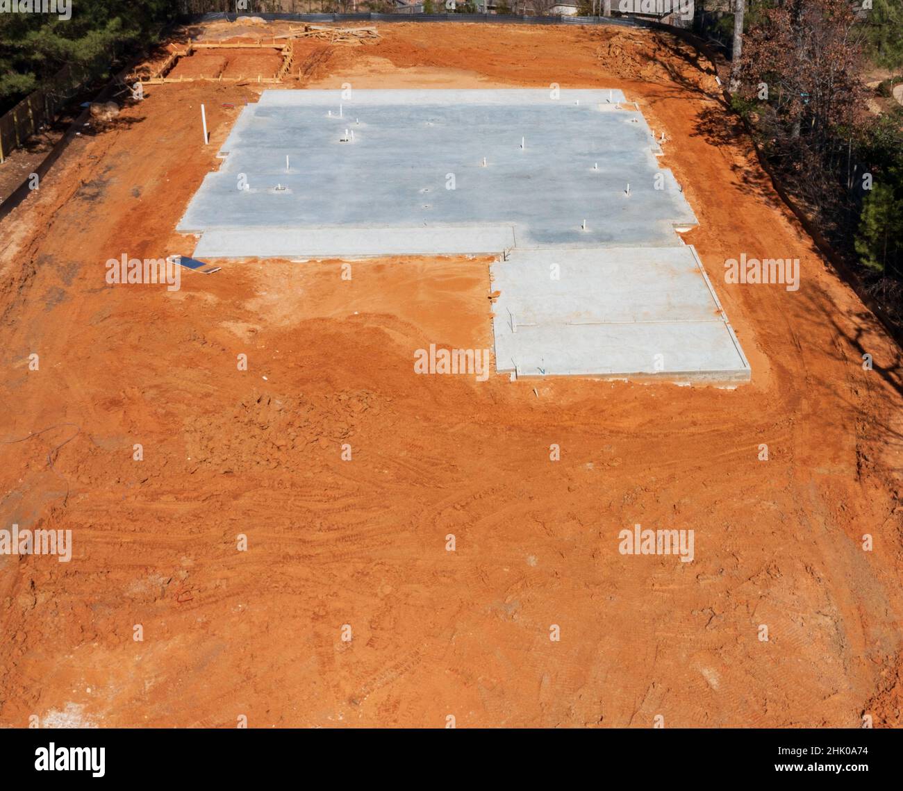 Concrete slab on a dirt lot for a new home. Stock Photo