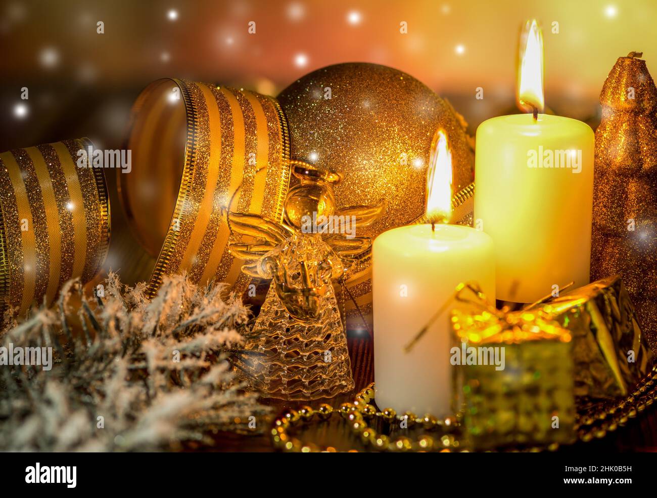 Angel and shiny candles on Christmas Eve Stock Photo Alamy