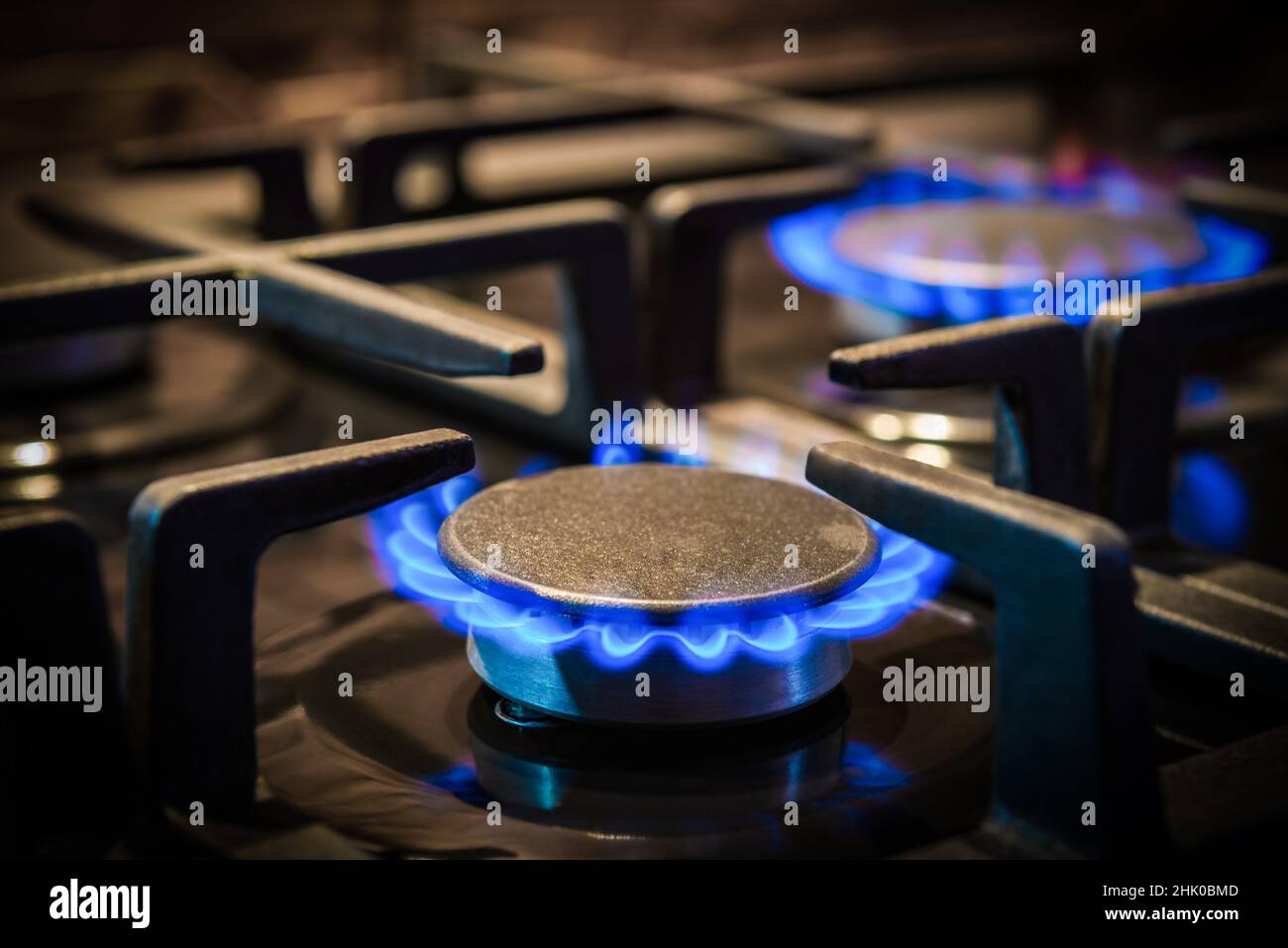 Kitchen gas burner with flame close up Stock Photo Alamy