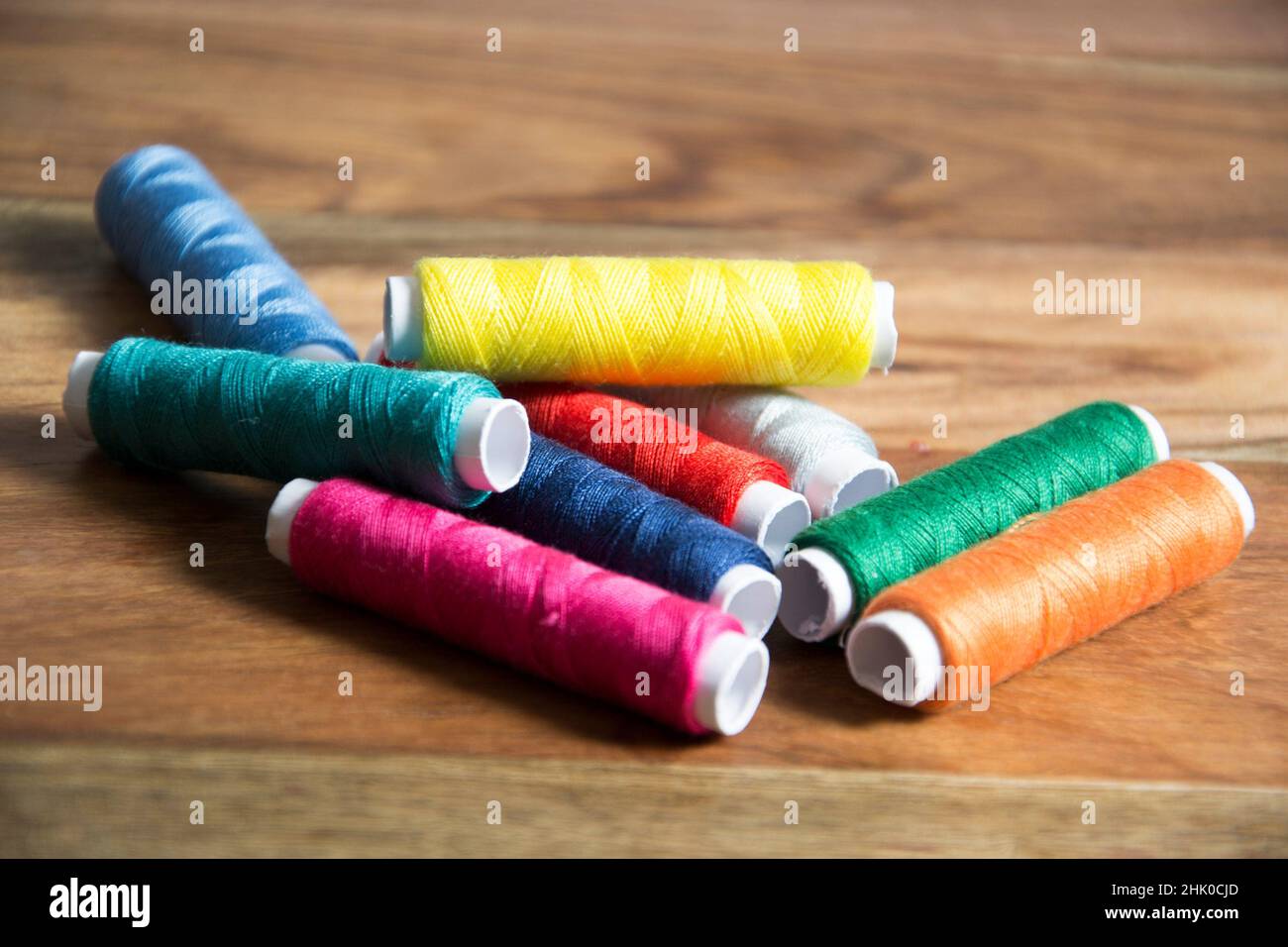 colorful sewing thread Stock Photo - Alamy