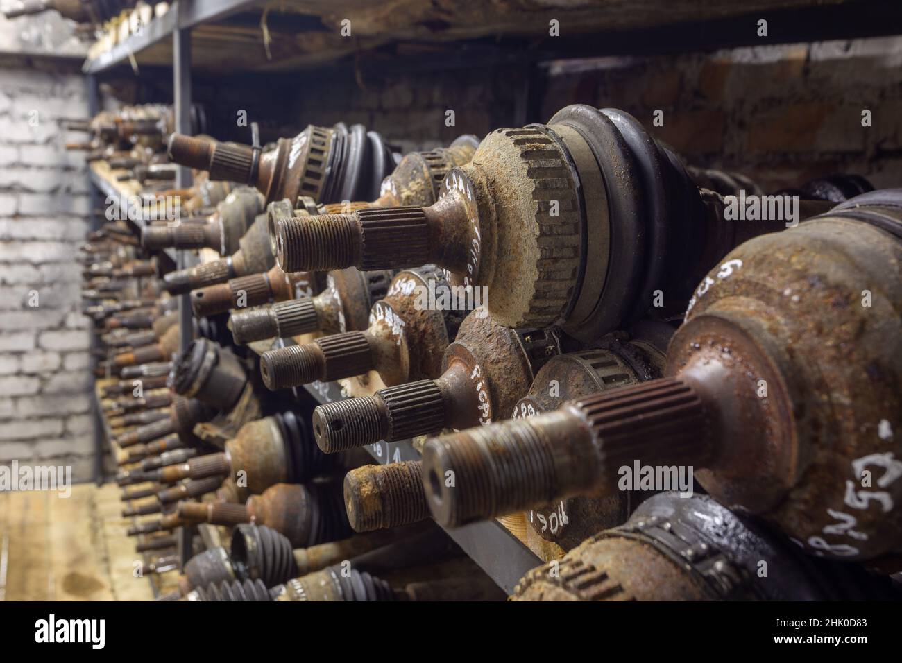 Used car parts on the factory shelf. Used auto parts for sale in a