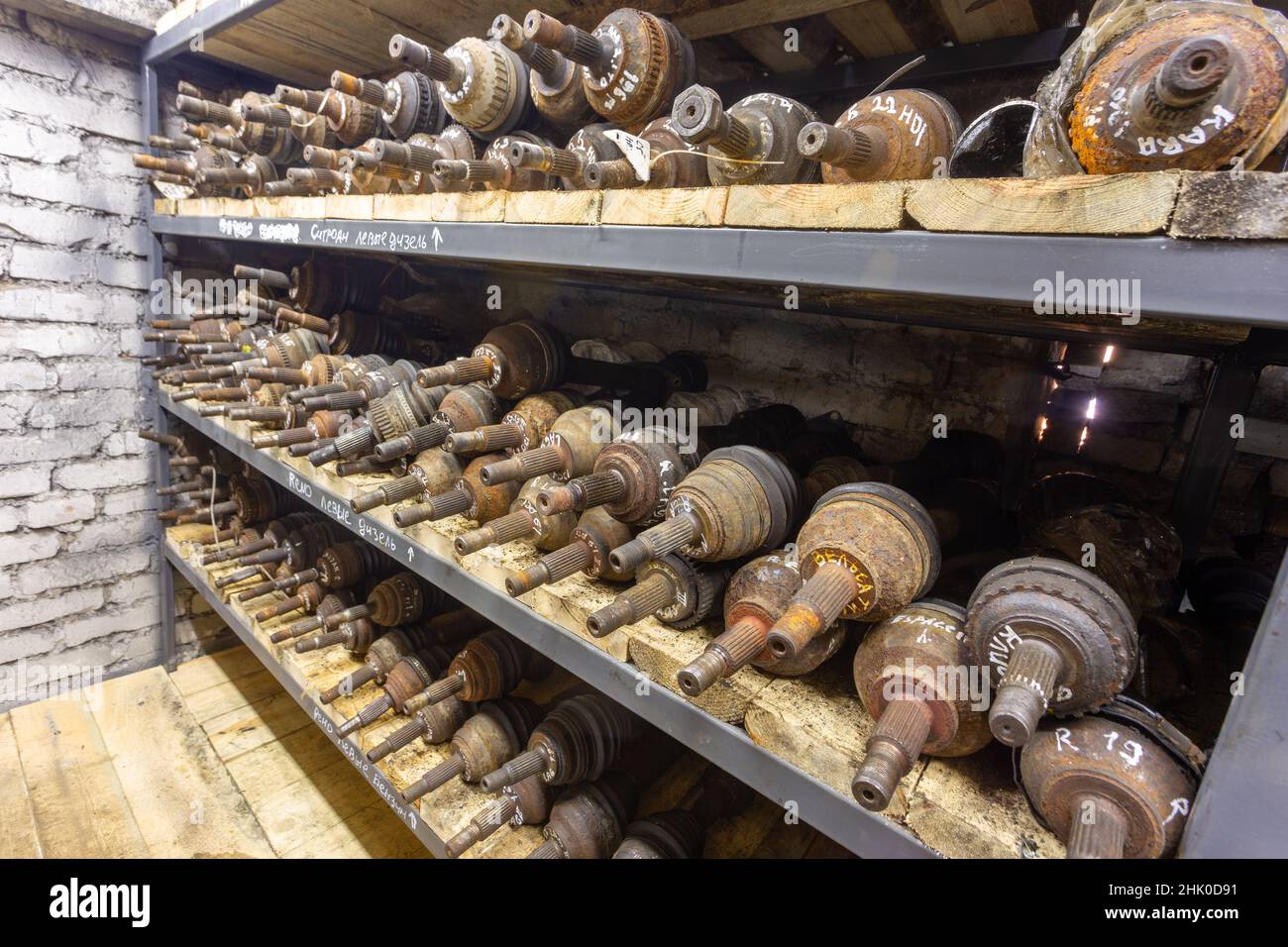 Used car parts on the factory shelf. Used auto parts for sale in a