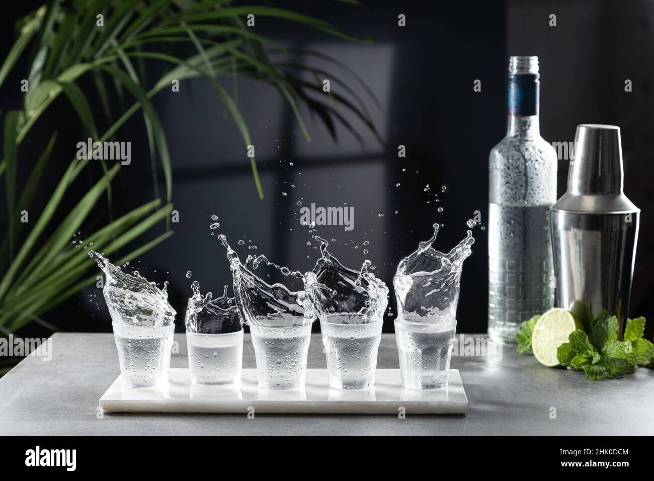 Vodka splash in shot glasses at the bar Stock Photo Alamy