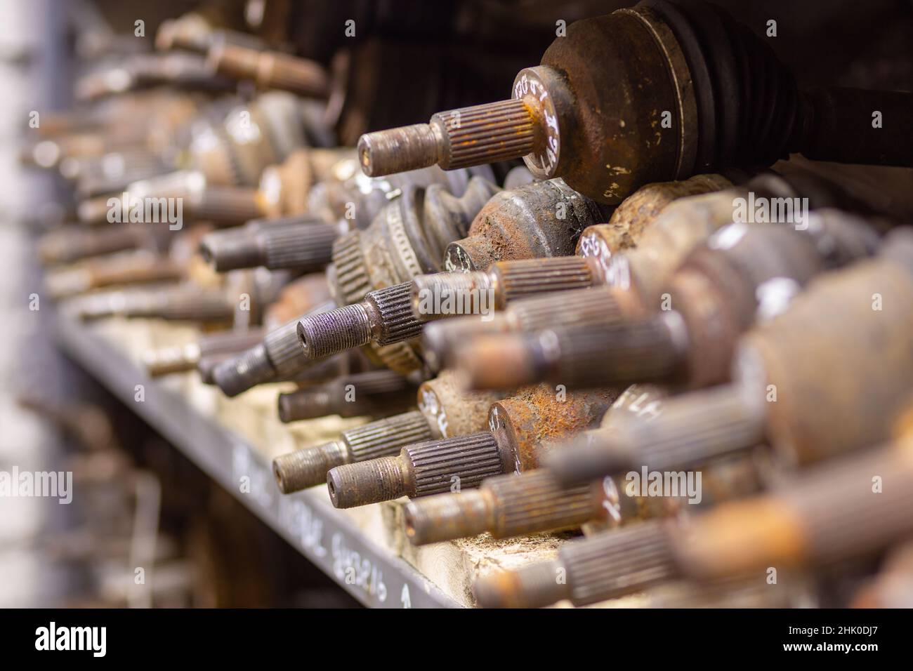 Used car parts on the factory shelf. Used auto parts for sale in a