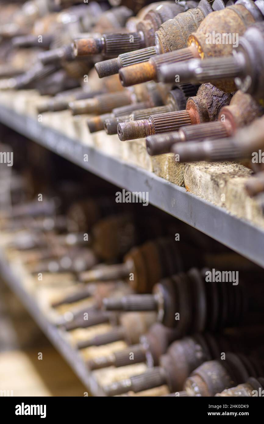 Used car parts on the factory shelf. Used auto parts for sale in a